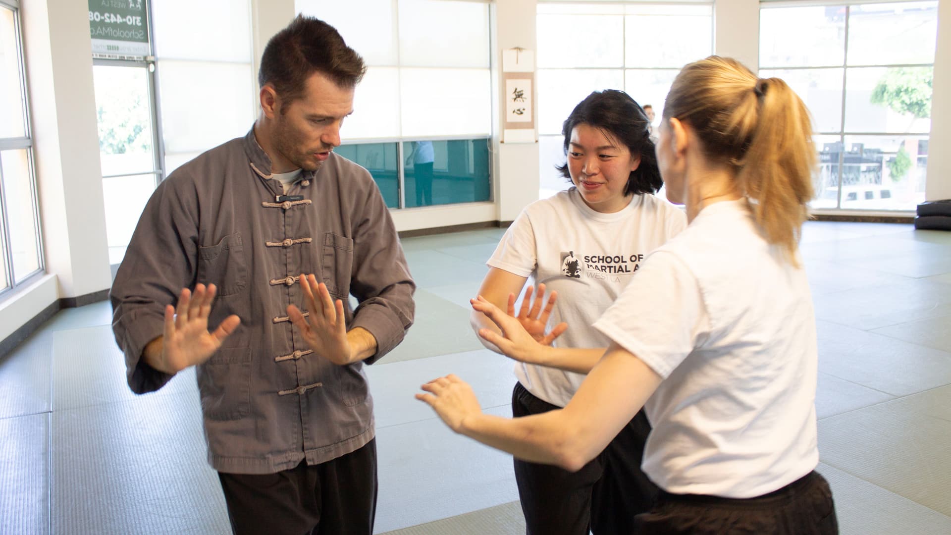 Tai_Chi_dojo_partner_form_Sifu_instructing_1920X1080