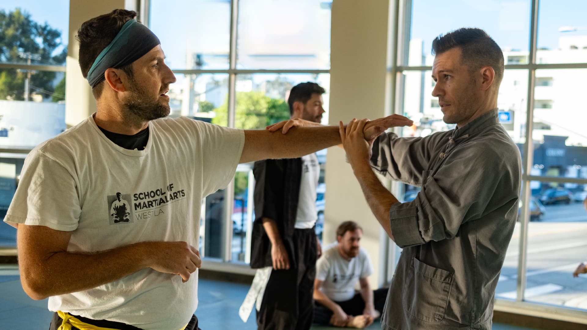 Adult dojo knifehand Sifu instructing